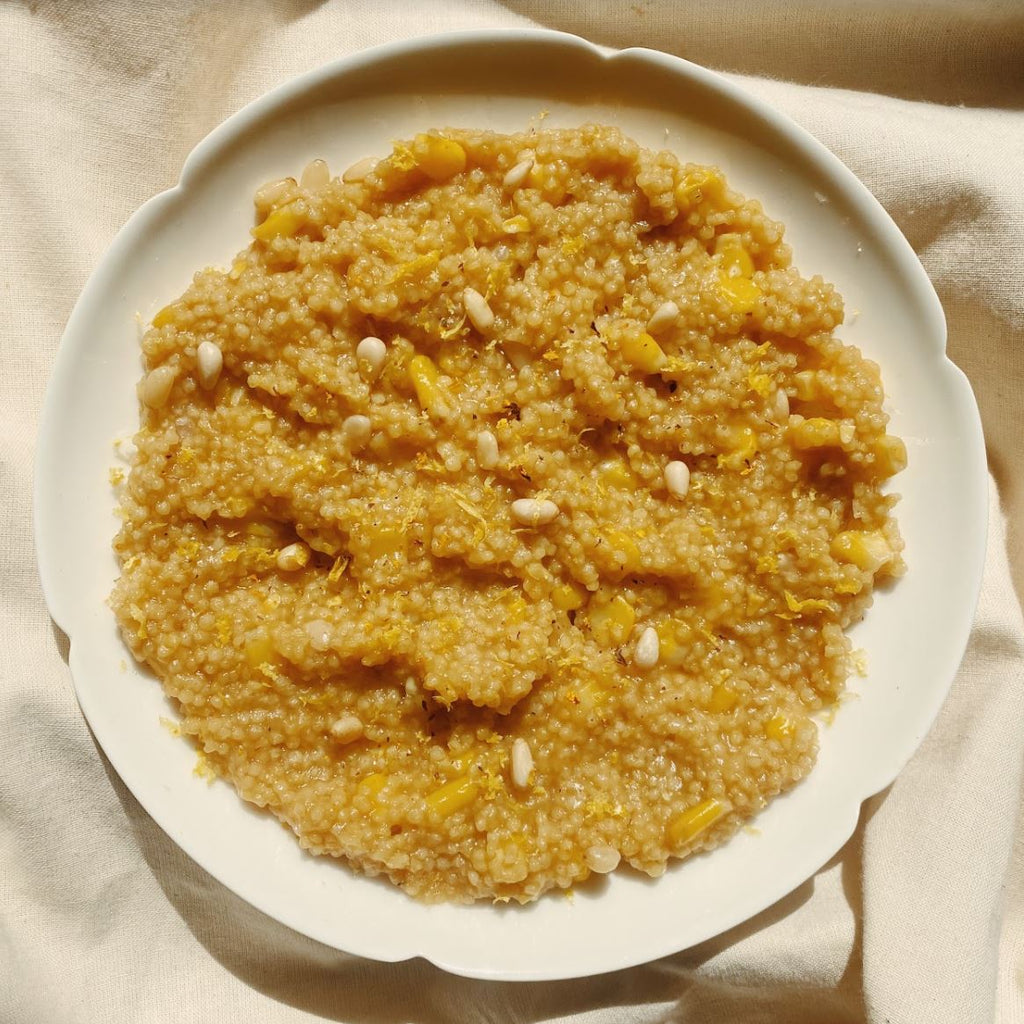 Golden Millet Corn Porridge with Ghee and Pine Nuts